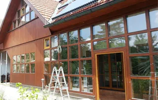 Sanierung Holz Glasfassade mit Glasklemmprofilen